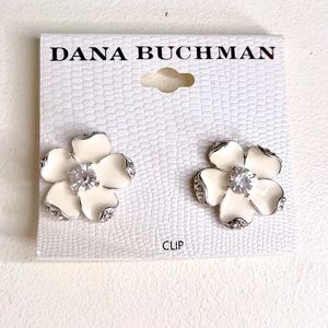 White Bloom clip earrings by Dana Buchman